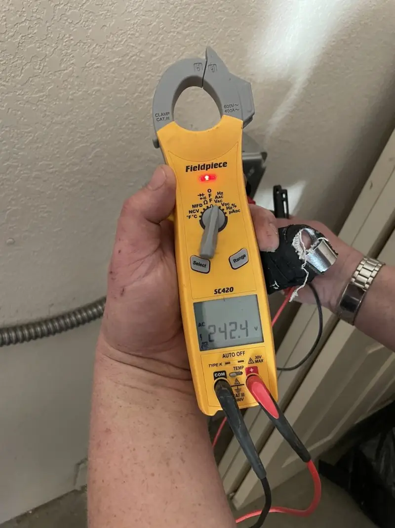 Voltage testing with clamp meter during Electrical Installation Services in Roanoke Rapids